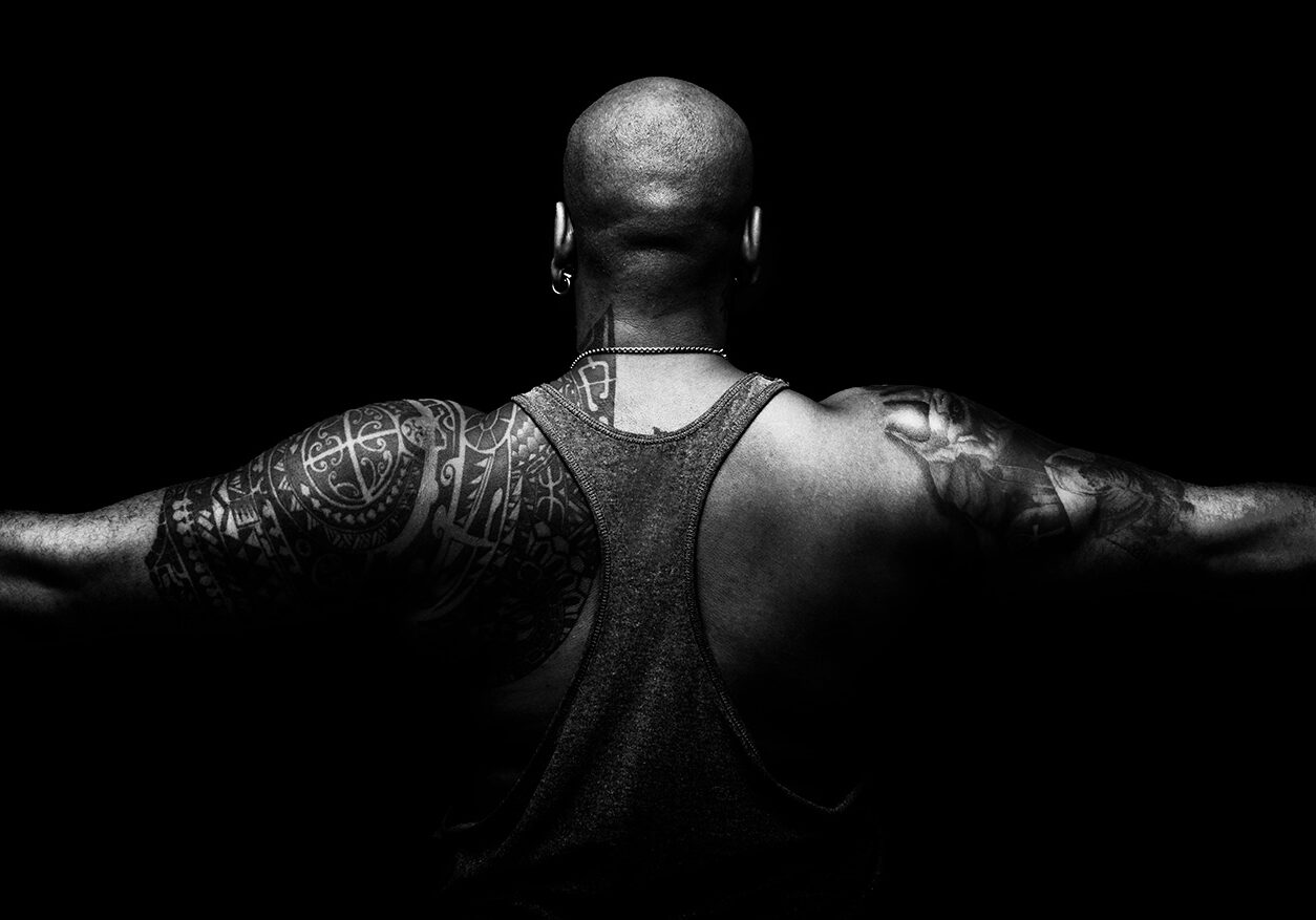 16-back-and-arms-of-black-man-tattooed